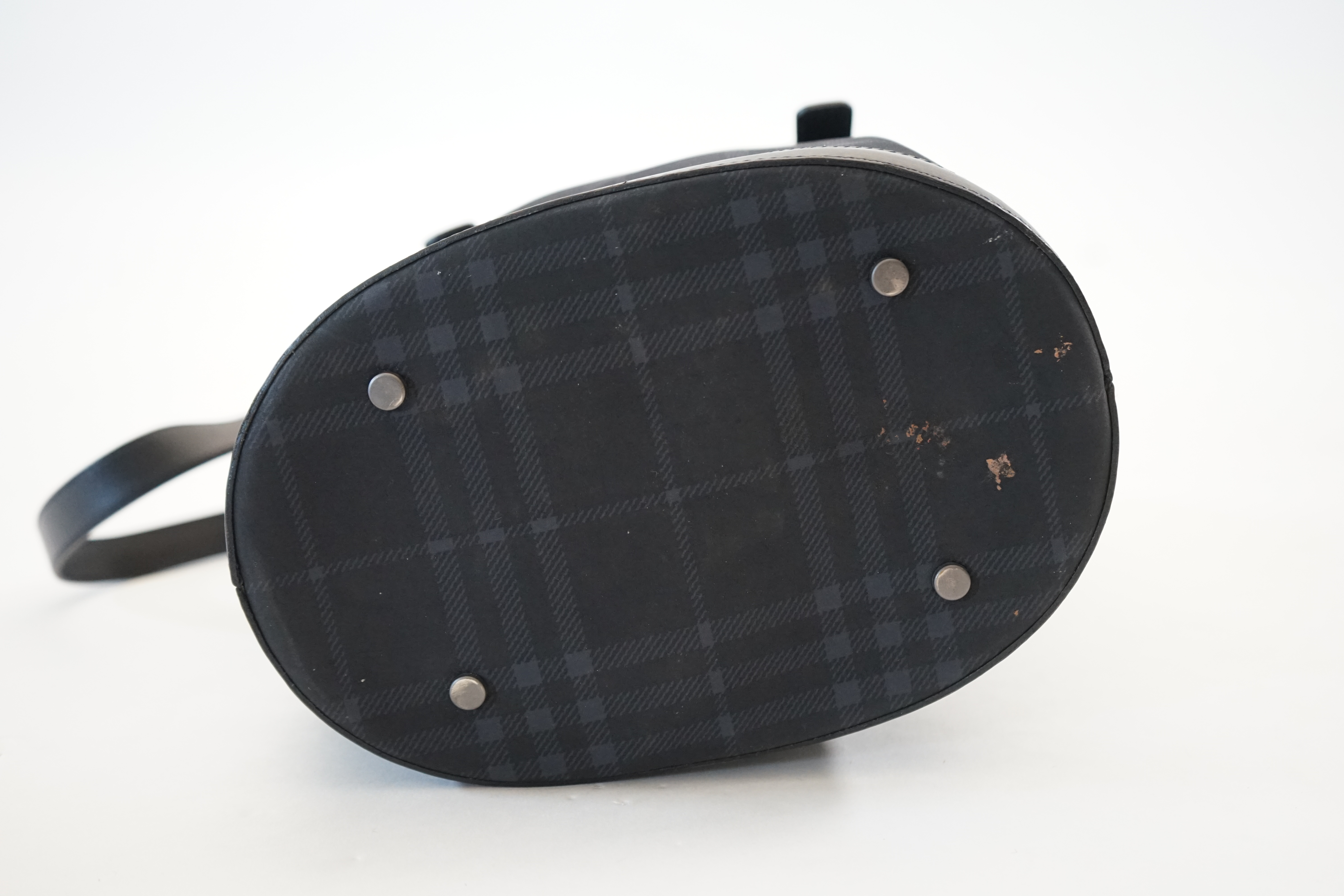 A Burberry bucket bag in blue black tartan canvas and leather, width 26cm, depth 16cm, height 27cm